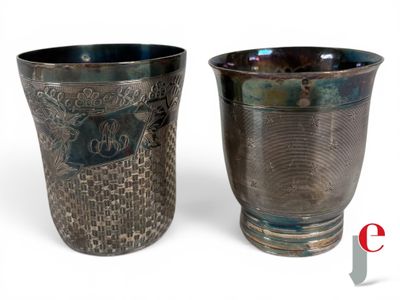 two cups sitting next to each other on a white surface