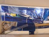 a box of toothbrushes and toothpaste in it