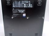 the back of a laptop computer with a black back panel