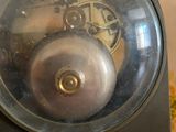 a clock that is sitting on top of a table
