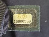 a close up of a tie with a tag on it