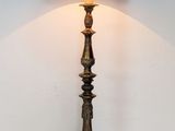 a lamp that is on a table with a lamp shade on it
