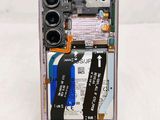 a picture of a cell phone with a broken battery