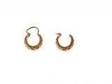 a pair of gold hoop earrings on a white background
