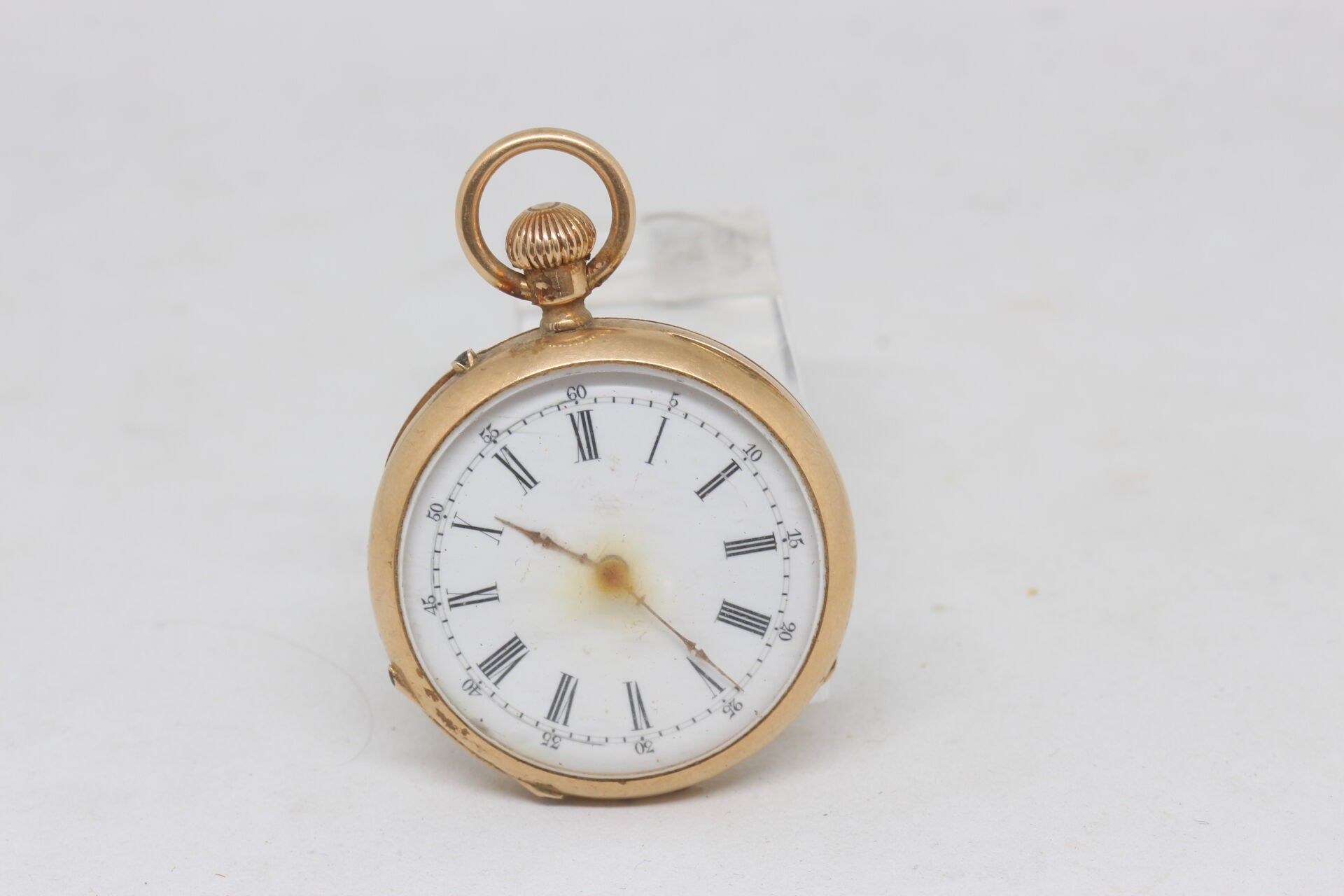 montre de col boitier et double fond en or 18k.