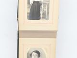 an old photo of a couple of women standing next to each other