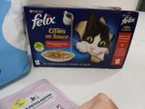 a box of cereal and a bag of cereal on a table