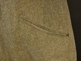 a close up of a man ' s jacket and tie