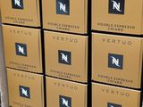 several boxes of wine are stacked on top of each other