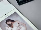 a picture of a woman in a white dress and a picture of a man holding a cat