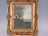 an oil painting of a landscape on a easel with a tree in the foreground