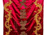 a red and gold dragon banner hanging on a wall