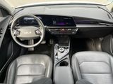 the interior of a car with a steering wheel, dashboard, and dash board