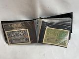 a couple of different types of currency sitting on top of each other