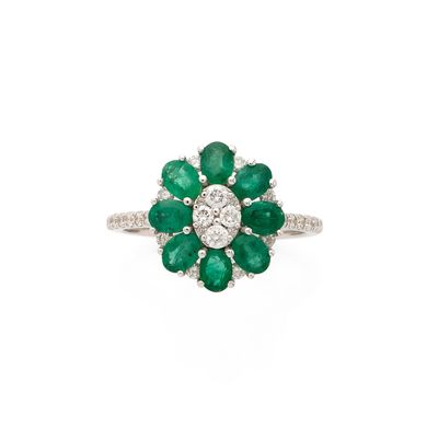 BAGUE ornée d'un décor floral composé d'émeraudes ovales et …