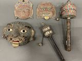 several different items including a mask, a hammer, and a hammer