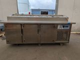 an image of a stainless steel counter top in a warehouse
