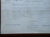 an old document on the wall of a building