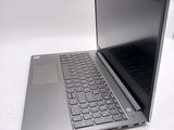 a laptop computer sitting on top of a white table