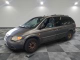 an image of a silver van parked in a garage