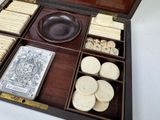 a wooden box filled with different types of cookies