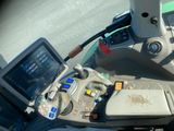a view of the dashboard of a bus from the driver ' s seat