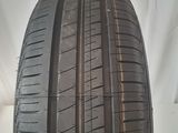 a close up of a tire on a white surface