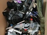 a cardboard box full of assorted items in it