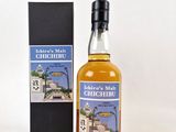 an image of a bottle of whisky next to a box