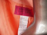 a close up of a label on a dress on a mannequin mannequin mannequin mannequin mannequin mannequin mannequin