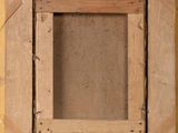 an image of a picture frame with a picture hanging on it