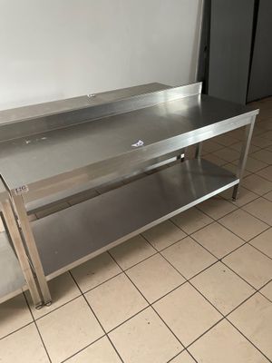 Table inox entretoisée et à dosseret de 180 - Photo 1