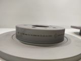 a picture of a spool of tape on a table