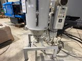 a machine that is sitting in the middle of a warehouse