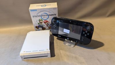 Console de jeux Nintendo Wii avec les jeux Mario Kart et Mario Kart Wii