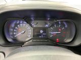 a close up of a car dashboard with a speedometer and gauges