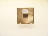 a small metal object on a stand with a label on it