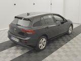the back end of a grey volkswagen e - golf parked in a garage