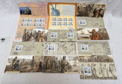 a lot of stamps that are on the table