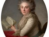 un portrait ovale représentant une femme tenant un livre dans la main droite