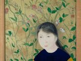 a painting of a woman with flowers on the wall