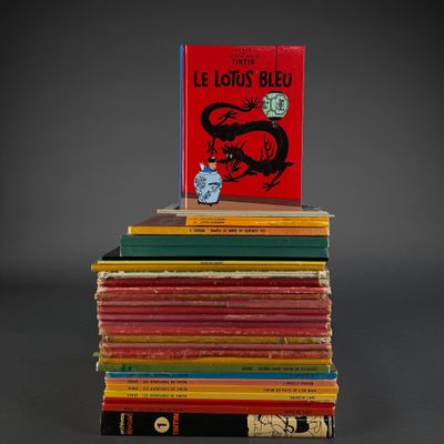 books stacked on top of each other on a gray surface