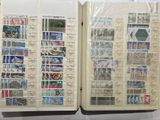 a book with stamps on the pages and a book with stamps on the pages