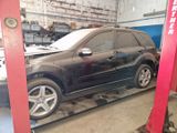a picture of a car being worked on in a garage