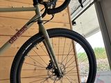 a bike hanging on the wall in a garage