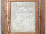 an old picture of a picture frame with a piece of paper taped to it