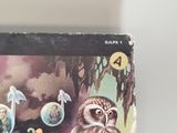 a picture of a book with a picture of an owl on it