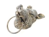 a metal object that looks like a mouse on a towel ring