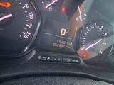 a close up of a car dashboard with a speedometer