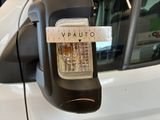 a parking meter that has a sticker on the side of it